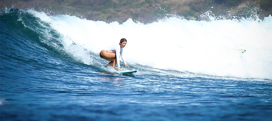 LMBK Surf House guest surfing Inside Ekas Bay in Kuta Lombok