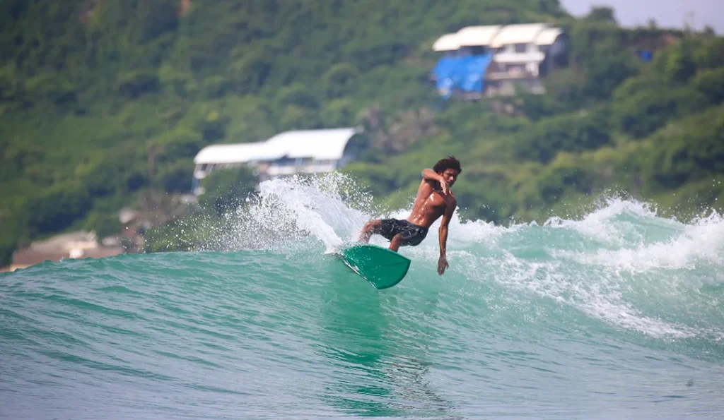 LMBK Surf House guest surfing Don Don Lombok