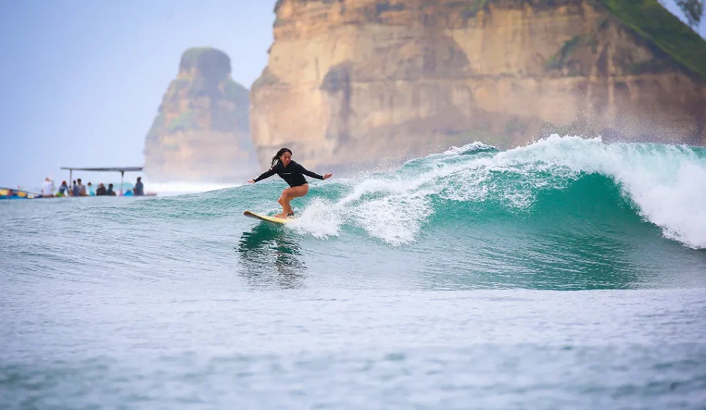 LMBK Surf House guest surfing Inside Gerupuk Kuta Lombok