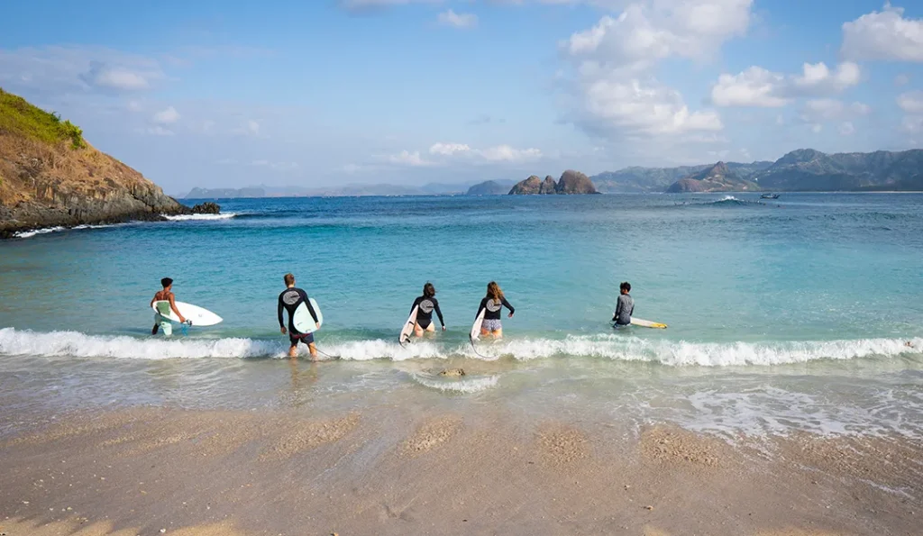 LMBK Surf House guests preparing to surf Mawi Kuta Lombok
