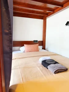 4-bed dorm bed setup at LMBK Surf House Lombok